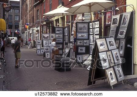 Canada, Quebec, Montreal, Street artists display their work along Rue St. Amable in Vieux Montreal. View Large Photo Image Stock Image - Canada, Quebec, Montreal, Street artists display their work along Rue St. Amable in Vieux Montreal.. Fotosearch