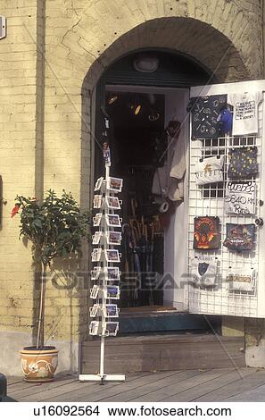 Canada, Quebec, Postcards and tee shirts are displayed outside a boutique in Quartier Petit-Champlain of Quebec City., View Large Photo Image Picture - Canada, Quebec, Postcards and tee shirts are displayed outside a boutique in Quartier Petit-Champlain of Quebec City., . Fotosearch