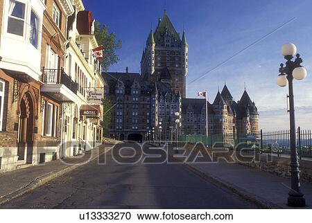 Stock Image -  Canada, Quebec, Quebec City, Hotels along street which leads to Chateau Frontenac in Old Quebec City.. Fotosearch