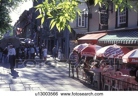 Stock Photograph -  Canada, Quebec, Quebec City, Outdoor [cafe, restaurant] at Place D'Armes in Old Quebec City.. Fotosearch