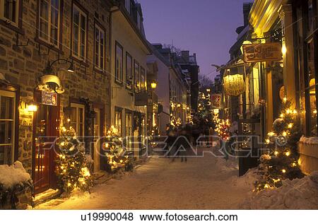 Canada, Quebec, Rue Petit Champlain in Quebec City is illuminated at night (evening) in winter., View Large Photo Image Stock Photo - Canada, Quebec, Rue Petit Champlain in Quebec City is illuminated at night (evening) in winter., . Fotosearch