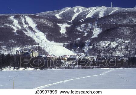 Canada, Quebec, Scenic view of Mont Tremblant and the ski slopes of Tremblant Ski Resort in the winter View Large Photo Image Stock Photograph - Canada, Quebec, Scenic view of Mont Tremblant and the ski slopes of Tremblant Ski Resort in the winter . Fotosearch