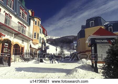 Stock Image -  Canada, Quebec, Tremblant Ski Resort at Mont Tremblant in winter. The village has an Old Quebec City atmosphere . Fotosearch