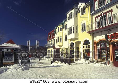 Stock Photo -  Canada, Quebec, Tremblant Ski Resort at Mont Tremblant in winter. The village has an Old Quebec City atmosphere . Fotosearch