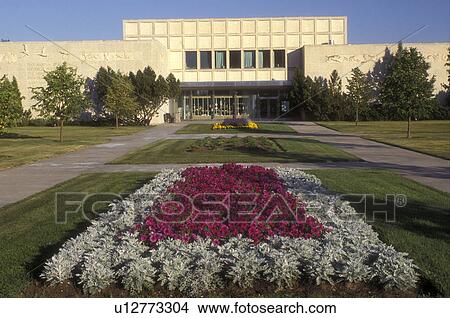 Picture -  Canada, Saskatchewan, Regina, Flowers decorate the grounds of The Royal Saskatchewan Museum at Wascana Center in Regina.. Fotosearch