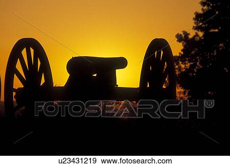 cannon, war, Gettysburg, battlefield, battle, Gettysburg Military Park, Pennsylvania, Silhouette of cannon at sunset on East Cemetery Hill a battlefield site at Gettysburg National Military Park in Gettysburg in the state of Pennsylvania. View Large Photo Image Stock Photo - cannon, war, Gettysburg, battlefield, battle, Gettysburg Military Park, Pennsylvania, Silhouette of cannon at sunset on East Cemetery Hill a battlefield site at Gettysburg National Military Park in Gettysburg in the state of Pennsylvania.. Fotosearch