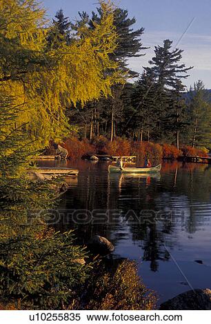 canoe, lake, fall, Baxter State Park, Maine, Person canoeing on Daicey Pond in early morning at Baxter State Park. View Large Photo Image Stock Photography - canoe, lake, fall, Baxter State Park, Maine, Person canoeing on Daicey Pond in early morning at Baxter State Park. . Fotosearch