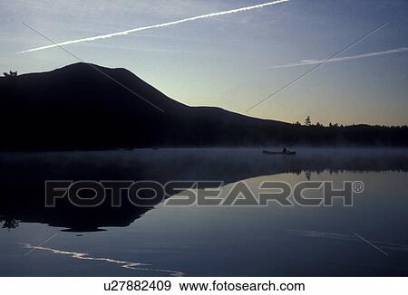 canoe, mountain, lake, Baxter State Park, Maine, Mt. Katahdin, Canoeing on Daicey Pond in early morning at Baxter State Park. Mt. Katahdin reflects in the lake. View Large Photo Image Stock Photo - canoe, mountain, lake, Baxter State Park, Maine, Mt. Katahdin, Canoeing on Daicey Pond in early morning at Baxter State Park. Mt. Katahdin reflects in the lake.. Fotosearch