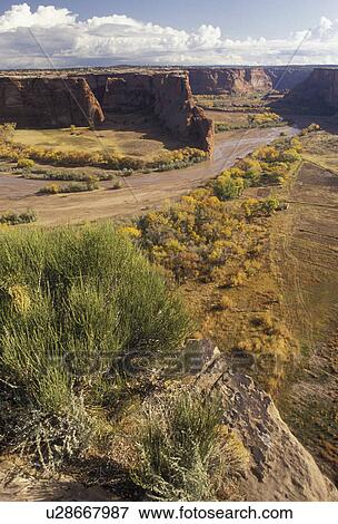 Stock Photo -  Canyon De Chelly, Canyon De Chelly National Monument, Arizona, View from Tsegi Overlook in Canyon De Chelly Nat'l Monument in the state of Arizona.. Fotosearch