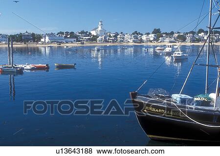 Stock Photo -  Cape Cod, Massachusetts, Provincetown, Boats buoyed at Provincetown Harbor in Provincetown, Massachusetts. . Fotosearch