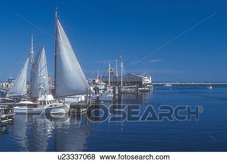 Cape Cod, Massachusetts, Provincetown, Boats moored at the pier on Provincetown Harbor in Provincetown, Massachusetts. View Large Photo Image Stock Photo - Cape Cod, Massachusetts, Provincetown, Boats moored at the pier on Provincetown Harbor in Provincetown, Massachusetts. . Fotosearch