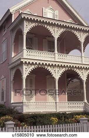 Cape May, victorian home, New Jersey, The Pink House wedding cake style in Cape May in the state of New Jersey.  View Large Photo Image Stock Image -  Cape May, victorian home, New Jersey, The Pink House wedding cake style in Cape May in the state of New Jersey. . Fotosearch