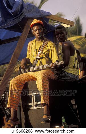 Stock Photo -  Caribbean, carnival, St. Martin, Marigot, Caribbean Islands, Local black musicians play music for a parade during the carnival in Marigot the French capital of the island of Saint Martin (french part).. Fotosearch