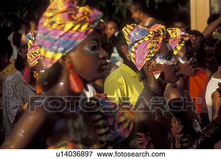Caribbean, carnival, St. Martin, Marigot, Caribbean Islands, Local black women wear colorful costumes in a parade during the carnival in Marigot the French capital of the island of Saint Martin (french part). View Large Photo Image Stock Photo - Caribbean, carnival, St. Martin, Marigot, Caribbean Islands, Local black women wear colorful costumes in a parade during the carnival in Marigot the French capital of the island of Saint Martin (french part).. Fotosearch