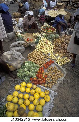Stock Photography -  Caribbean, street market, Haiti, Haitian women selling produce on the street in the city of Petionville in Haiti.. Fotosearch