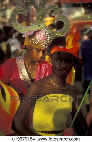 carnival, St. Martin, Caribbean, Marigot, Caribbean Islands, Local black people dancing in a parade dressed in colorful costumes for the carnival in Marigot the French capital of the island of Saint Martin (french part). View Large Photo Image Picture - carnival, St. Martin, Caribbean, Marigot, Caribbean Islands, Local black people dancing in a parade dressed in colorful costumes for the carnival in Marigot the French capital of the island of Saint Martin (french part).. Fotosearch