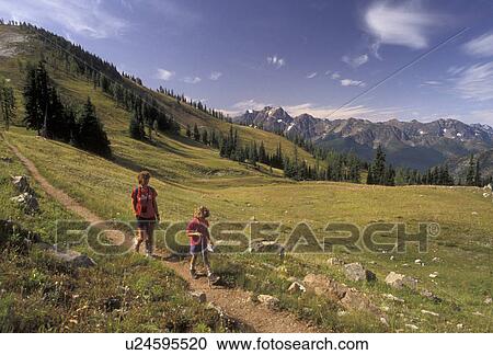 Cascades, hiking, Cascade Range, Pacific Crest Trail, Washington, Mother and daughter (6 years old) hike the Pacific Crest Trail in the Northern Cascade Mountains in the state of Washington. View Large Photo Image Stock Image - Cascades, hiking, Cascade Range, Pacific Crest Trail, Washington, Mother and daughter (6 years old) hike the Pacific Crest Trail in the Northern Cascade Mountains in the state of Washington. . Fotosearch
