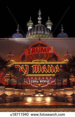 Stock Image -  casino, Atlantic City, Taj Mahal, New Jersey, The entrance to Taj Mahal Casino Resort illuminated at night in Atlantic City in the state of New Jersey. . Fotosearch