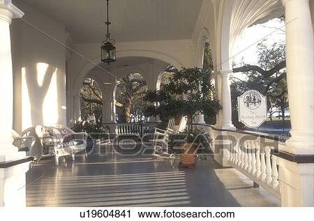 Stock Image -  Charleston, Inn, South Carolina, The picturesque porch at Two Meeting Street Inn in Charleston, South Carolina. . Fotosearch