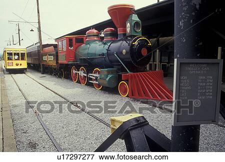 Stock Photo -  Chattanooga, locomotive, train, Choo Choo Train, Tennessee, Locomotive and trolley are displayed at Chattanooga Choo Choo and Terminal Station in Chattanooga in the state of Tennessee.. Fotosearch