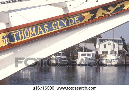 Chesapeake Bay, Maryland, Tilghman Island, Dogwood Harbor, The bow of the boat named Thomas Clyde docked Dogwood Harbor on Tilgham Island. View Large Photo Image Stock Photograph - Chesapeake Bay, Maryland, Tilghman Island, Dogwood Harbor, The bow of the boat named Thomas Clyde docked Dogwood Harbor on Tilgham Island.. Fotosearch