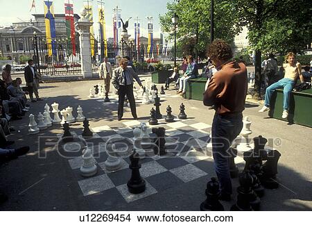 chess, Geneva, Switzerland, Europe, Men playing a giant public chess game at the Promenade des Bastions in Geneva. View Large Photo Image Picture - chess, Geneva, Switzerland, Europe, Men playing a giant public chess game at the Promenade des Bastions in Geneva.. Fotosearch