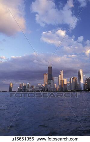 Chicago, Illinois, A view of the skyline of downtown Chicago from the waters of Lake Michigan at sunset View Large Photo Image Stock Photograph - Chicago, Illinois, A view of the skyline of downtown Chicago from the waters of Lake Michigan at sunset . Fotosearch