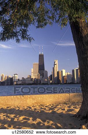 Stock Image -  Chicago, skyline, Illinois, Skyline of downtown Chicago from Lincoln Park on Lake Michigan in the state of Illinois.. Fotosearch