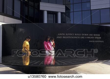 Civil Rights Memorial, Montgomery, Alabama, Two black women with a baby read the inscriptions on the Civil Rights Memorial in Montgomery in the state of Alabama. View Large Photo Image Stock Image -  Civil Rights Memorial, Montgomery, Alabama, Two black women with a baby read the inscriptions on the Civil Rights Memorial in Montgomery in the state of Alabama.. Fotosearch