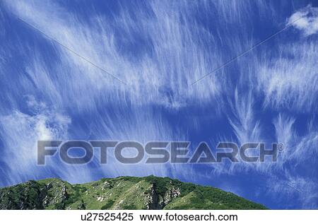 clouds, sky, France, Alps, mountains, Europe, Cloud formation in blue sky over green mountain in Savoie. View Large Photo Image Stock Photography - clouds, sky, France, Alps, mountains, Europe, Cloud formation in blue sky over green mountain in Savoie.. Fotosearch