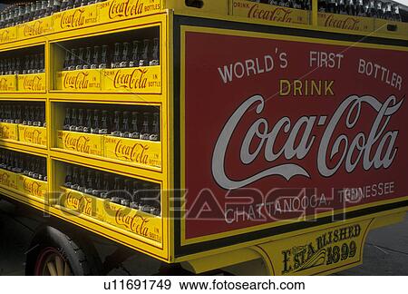Stock Photo -  Coca-Cola, Chattanooga Choo Choo, Chattanooga, Tennessee, A yellow and red antique Coca-Cola truck displayed at Chattanooga Choo Choo and Terminal Station in Chattanooga in the state of Tennessee.. Fotosearch