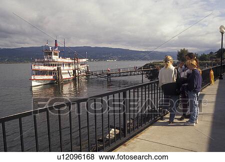 Columbia River, Cascade Locks, Columbia River Gorge, Oregon, paddle wheeler, People waiting to board the Sternwheeler Columbia Gorge a tourboat docked at Cascade Locks Marina Park on the Columbia River in the state of Oregon. View Large Photo Image Stock Photo - Columbia River, Cascade Locks, Columbia River Gorge, Oregon, paddle wheeler, People waiting to board the Sternwheeler Columbia Gorge a tourboat docked at Cascade Locks Marina Park on the Columbia River in the state of Oregon.. Fotosearch
