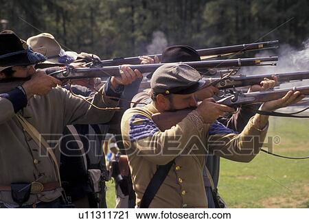 Confederate soldiers, Confederate, Civil War Reenactment, Stone Mountain, Atlanta, Georgia's Stone Mountain Park, Georgia, Men dressed as Confederate Soldiers fire muskets (rifles) during a Civil War Reenactment at the Antebellum Jubilee at Stone Mountai View Large Photo Image Stock Image - Confederate soldiers, Confederate, Civil War Reenactment, Stone Mountain, Atlanta, Georgia's Stone Mountain Park, Georgia, Men dressed as Confederate Soldiers fire muskets (rifles) during a Civil War Reenactment at the Antebellum Jubilee at Stone Mountai. Fotosearch
