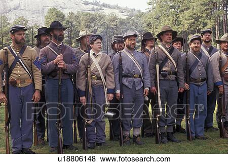 Confederate soldiers, Confederate, Civil War Reenactment, Stone Mountain, Atlanta, Georgia's Stone Mountain Park, Georgia, Men dressed as Confederate Soldiers stand in formation waiting for command from officer during a Civil War Reenactment at the Anteb View Large Photo Image Stock Photo - Confederate soldiers, Confederate, Civil War Reenactment, Stone Mountain, Atlanta, Georgia's Stone Mountain Park, Georgia, Men dressed as Confederate Soldiers stand in formation waiting for command from officer during a Civil War Reenactment at the Anteb. Fotosearch