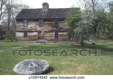 Stock Image -  Connecticut, Deacon John Grave House in Madison, Connecticut in the spring . Fotosearch
