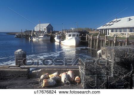 Connecticut, Lobster traps and fishing boats docked in the harbor in Guilford, Connecticut View Large Photo Image Picture - Connecticut, Lobster traps and fishing boats docked in the harbor in Guilford, Connecticut . Fotosearch
