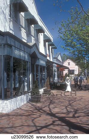 Stock Photograph -  Connecticut, Shops along main street in Westport, Connecticut in the spring . Fotosearch