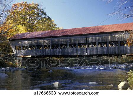 covered bridge, New Hampshire, fall, A red roofed wooden covered bridge spans across the Swift River on Kancamagus Highway in the White Mountain National forest. View Large Photo Image Stock Image - covered bridge, New Hampshire, fall, A red roofed wooden covered bridge spans across the Swift River on Kancamagus Highway in the White Mountain National forest. . Fotosearch