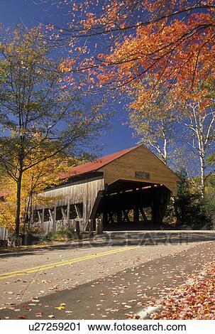 covered bridge, New Hampshire, White Mountains, fall, A covered bridge with a red roof is surrounded by colorful fall foliage on a beautiful autumn day in the White Mountain National Forest. View Large Photo Image Stock Image - covered bridge, New Hampshire, White Mountains, fall, A covered bridge with a red roof is surrounded by colorful fall foliage on a beautiful autumn day in the White Mountain National Forest. . Fotosearch