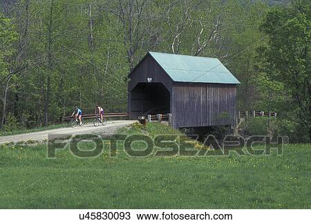 covered bridge, Vermont, VT, People biking over the Bowers or Brownsville Covered Bridge in West Windsor in the spring. View Large Photo Image Stock Image - covered bridge, Vermont, VT, People biking over the Bowers or Brownsville Covered Bridge in West Windsor in the spring.. Fotosearch
