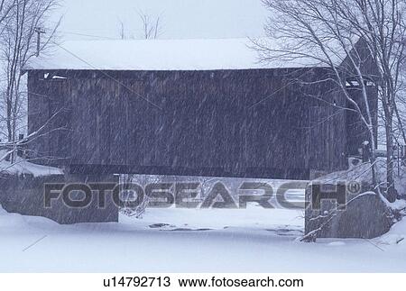 covered bridge, winter, Vermont, Scribner or Mudget Covered Bridge crosses the frozen Gibon River on a snowy wintry day in Johnson in Lamoille County in the state of Vermont. View Large Photo Image Stock Image - covered bridge, winter, Vermont, Scribner or Mudget Covered Bridge crosses the frozen Gibon River on a snowy wintry day in Johnson in Lamoille County in the state of Vermont.. Fotosearch
