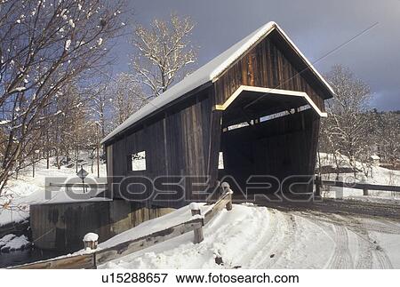 Stock Photo -  covered bridge, winter, Vermont, Warren Covered Bridge c. 1880 in Warren in Mad River Valley in Washington County in the state of Vermont.. Fotosearch