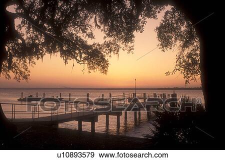 Cumberland Island, Georgia, Sunset on Cumberland Sound at Sea Camp Dock on Cumberland Island National Seashore, Georgia. View Large Photo Image Stock Photo - Cumberland Island, Georgia, Sunset on Cumberland Sound at Sea Camp Dock on Cumberland Island National Seashore, Georgia.. Fotosearch