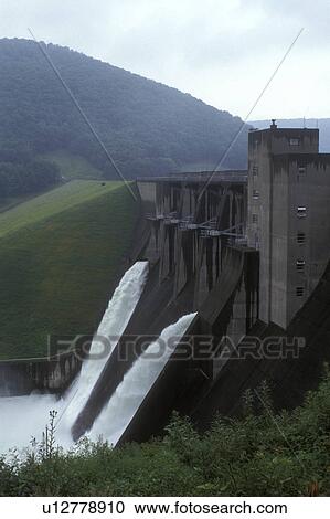 Stock Image -  dam, Warren, Pennsylvania, Water rushes down from the Kinzua Dam which holds back the water of the Allegheny Reservoir.. Fotosearch