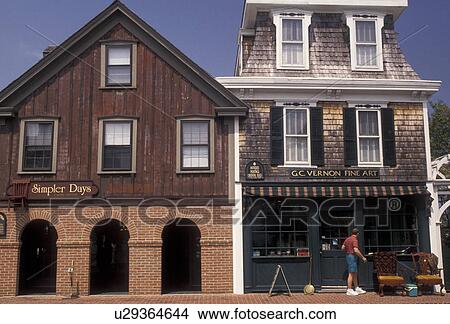 Picture -  Delaware, Lewes, Delaware Bay, Shops along the street in the historic town of Lewes in the state of Delaware.. Fotosearch