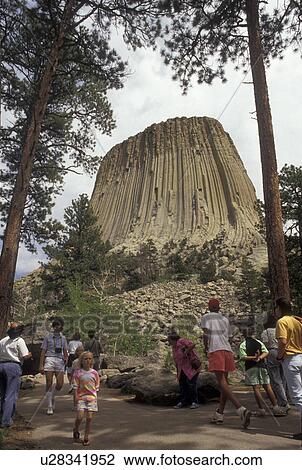 Devils Tower, Devils Tower National Monument, Wyoming, People walk up the Tower Trail to view the spectacular Devils Tower National Monument in the state of Wyoming. View Large Photo Image Stock Image - Devils Tower, Devils Tower National Monument, Wyoming, People walk up the Tower Trail to view the spectacular Devils Tower National Monument in the state of Wyoming.. Fotosearch