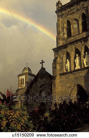 Dominica, Caribbean, Roseau, rainbow, Caribbean Islands, Rainbow after a storm over the cathedral in Roseau the capital of the island of Dominica. View Large Photo Image Stock Photo - Dominica, Caribbean, Roseau, rainbow, Caribbean Islands, Rainbow after a storm over the cathedral in Roseau the capital of the island of Dominica.. Fotosearch