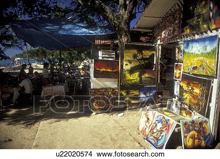 Dominican Republic, Caribbean, Caribbean Islands, Paintings for sale at outdoor market in Sosua in the Dominican Republic View Large Photo Image Picture -  Dominican Republic, Caribbean, Caribbean Islands, Paintings for sale at outdoor market in Sosua in the Dominican Republic. Fotosearch
