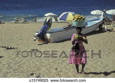 Dominican Republic, Caribbean, Sosua, Caribbean Islands, Local woman selling bananas on La Playita Beach in the Dominican Republic View Large Photo Image Stock Photography - Dominican Republic, Caribbean, Sosua, Caribbean Islands, Local woman selling bananas on La Playita Beach in the Dominican Republic. Fotosearch