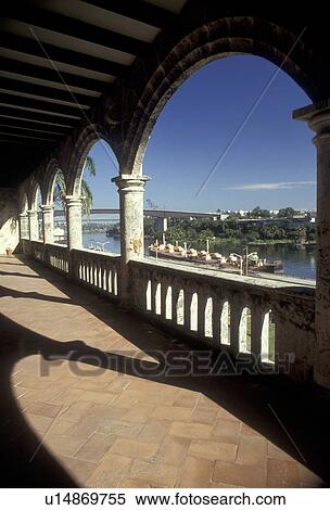 Dominican Republic, Santo Domingo, Caribbean, Caribbean Islands, Columbus Alcazar circa 1510 home of Columbus' son Diego looking out over the Ozama River in Santo Domingo the capital city of the Dominican Republic. View Large Photo Image Stock Photography - Dominican Republic, Santo Domingo, Caribbean, Caribbean Islands, Columbus Alcazar circa 1510 home of Columbus' son Diego looking out over the Ozama River in Santo Domingo the capital city of the Dominican Republic.. Fotosearch